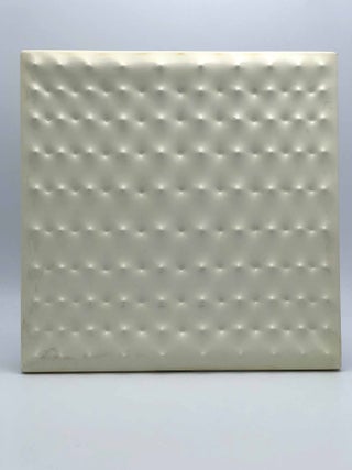 Estroflessione [Original Multiple in white plastic]. Accompanied by the book: Enrico Castellani. Enrico CASTELLANI, Vicenzo AGNETTI.